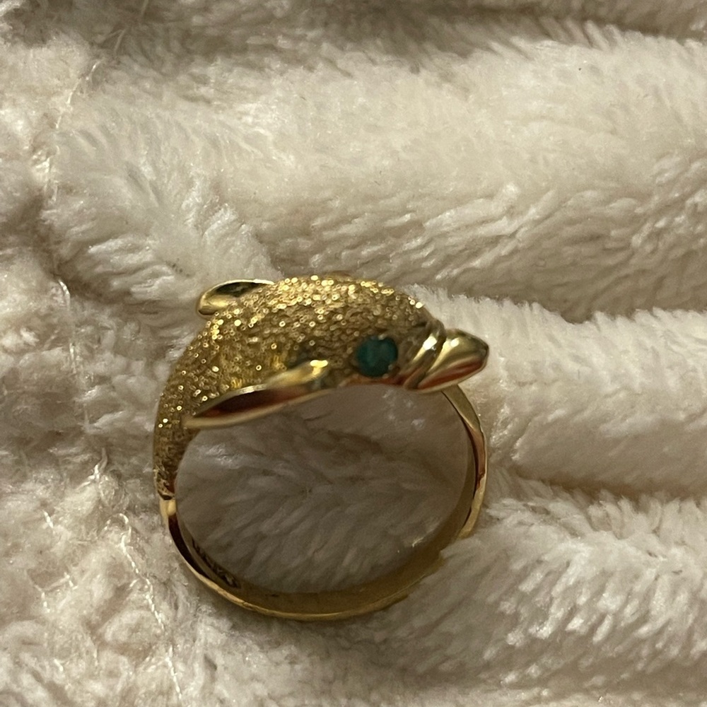 14k yellow gold dolphin ring with emerald eyes. Size 8.